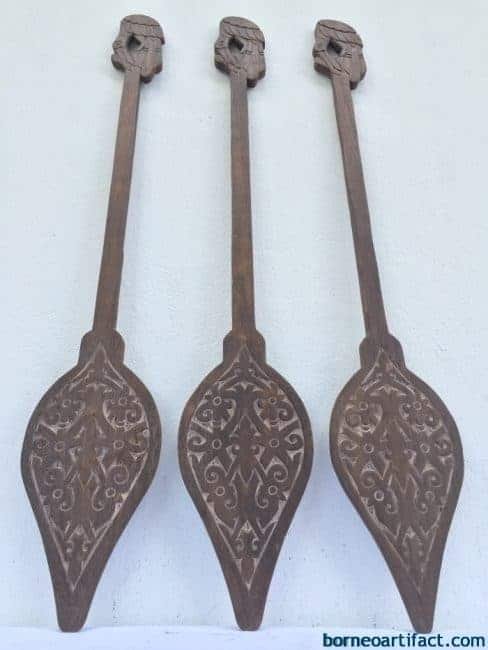 CARVED TRIBAL PADDLE