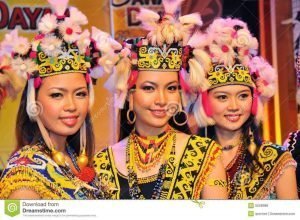 dayak girl in Borneo with ceremonial costume